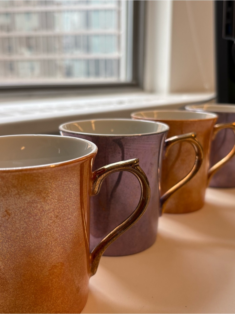 HIRAKI 4 china mugs iridescent gold glaze, 2 blue, 2 peach, elegant